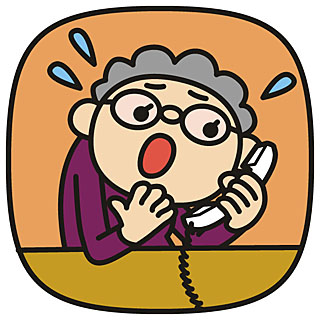 電話対応で慌てるおばあさんの画像